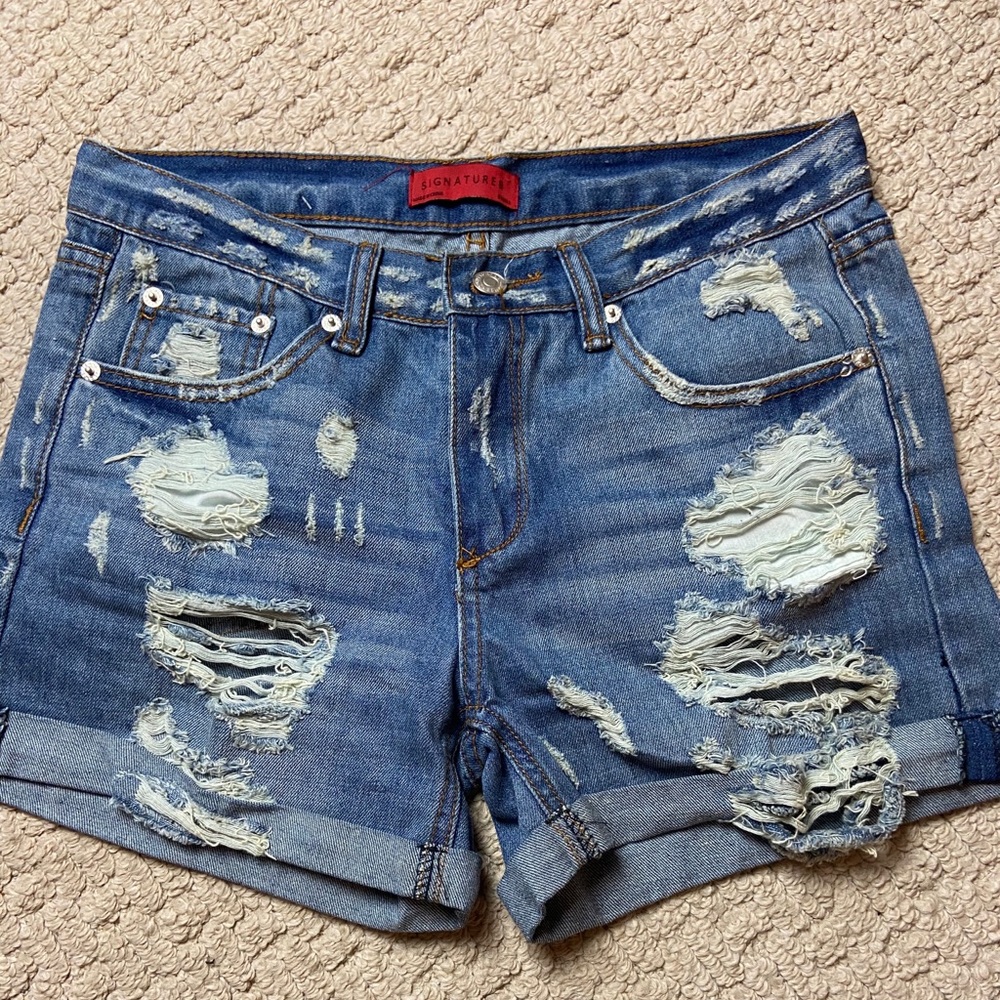 Distressed denim shorts